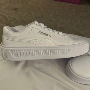 Brand New without box. Size 8 Puma platform sneakers. White.